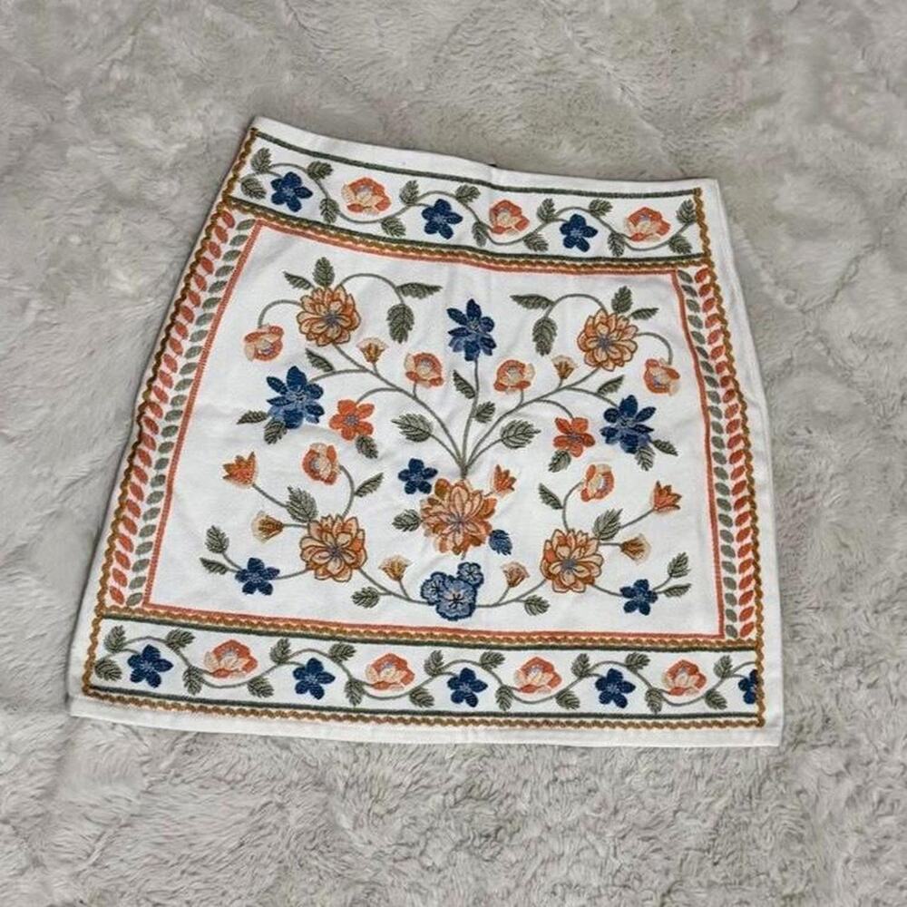White floral embroidered skirt with floral design